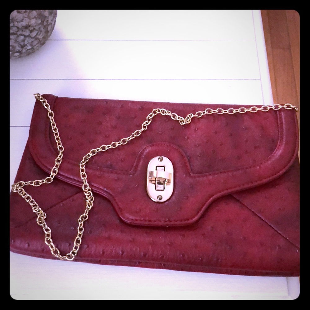 Aldo red faux leather clutch